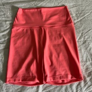 Yogalicious salmon pink bike shorts. Size medium. Worn only a handful of times.